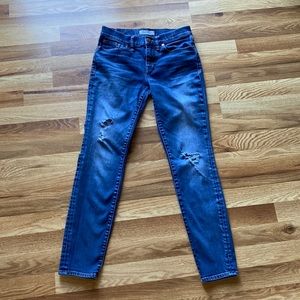 Madewell Skinny Skinny slightly destroyed jeans.
